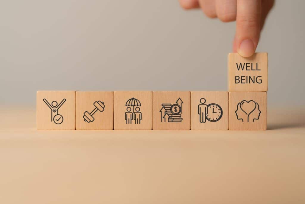 Elemente des betrieblichen Eingliederungsmanagements wie Bewegung, mentale Gesundheit und Work-Life-Balance als Bausteine fuer Wellbeing